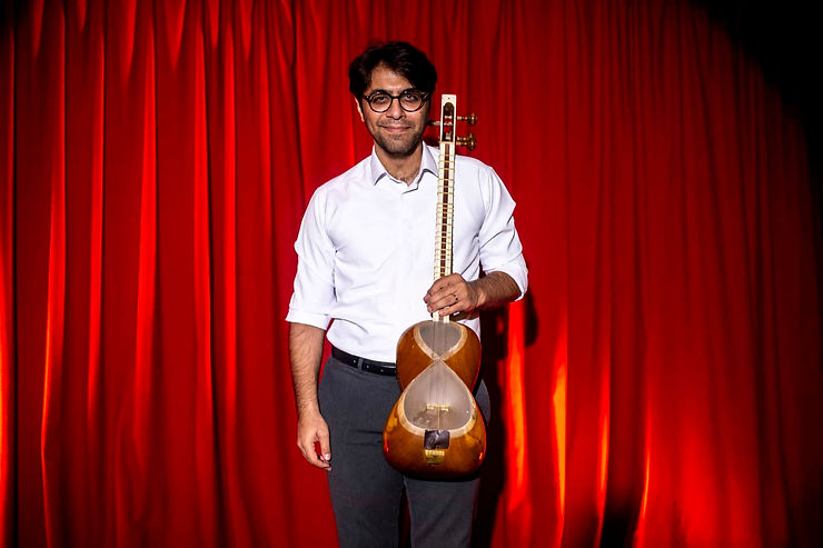 Fouad Samiei, a celebrated Iranian composer and multi-instrumentalist, is renowned for his distinctive ability to blend traditional Persian music with contemporary styles. Born in Tehran in 1989, his journey into music began with the percussion instrument Tombak during his early years. By the age of 19, Fouad turned his focus to the Tar, a traditional Iranian string instrument, under the tutelage of master musicians Ali Ghamsari and Hamidreza Khabazi. His dedication to music was not just a hobby but a profound passion that guided him through years of rigorous training and experimentation.