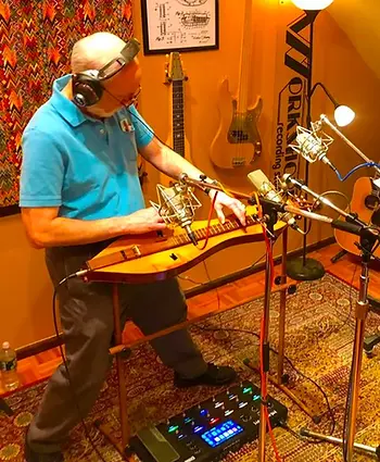 Making Waves is a very fun project. He slides through covers of many rock and roll classics. There is a seven-minute version of Bohemian Rhapsody by Queen. There's a cover of Born to Run that according to the info on Bandcamp, "rocks harder than the Boss's (Bruce Springsteen) version." There are covers of Call Me by Blondie, Lucy in the Sky With Diamonds by the Beatles, and Sweet Caroline by Neil Diamond. Yet to shoot for the moon, there is a cover of Ace of Spades by Motörhead. Let me say that Sam the Music Man and his team are making this rock and roll point quite well.