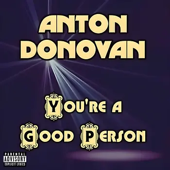 Anton Donovan’s new EP, You’re a Good Person, lands with the kind of theatrical flair that feels both self-aware and devastatingly sincere. A classically trained musician with roots in improvisational comedy, Donovan has always balanced satire with confession. Here, he leans into that duality with a jazz-inflected orchestral palette: brass sections that swell like Broadway overtures, strings that sigh like chamber music in disrepair, and a lyrical voice that reads like a series of unmasked monologues. It’s cabaret rebuilt with contemporary classical sensibilities. Part musical, part fever dream, part diary read under low lighting.