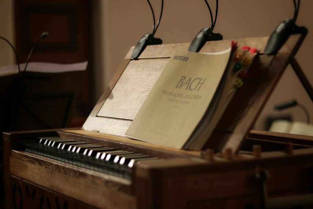Harpsichord with an open Bach music sheet. Photo: Aramis Cartam
