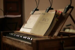 Harpsichord with an open Bach music sheet. Photo: Aramis Cartam
