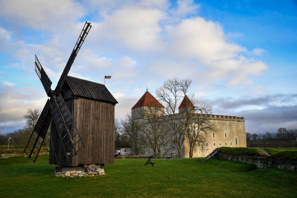 Saaremaa Estonia Tunitemusic Kuressaare Castle with adjacent windmill in scenic Estonia. Host of Saaremaa Opera Days. Saaremaa ooperipäevad eesti.